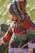 Меланжевый пуловер с ажурным узором и капюшоном