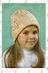 Бежевая шапочка с цветочками на отвороте