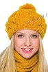Желтая шапочка с узором из кос