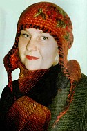 Оранжевая шапочка с ушками