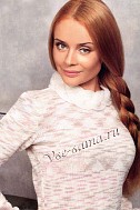 Меланжевый джемпер с косами