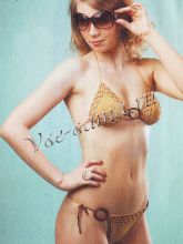 Бежевый купальник с коричневыми кольцами