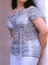 Ажурный пуловер с завышенной линией талии