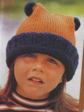 Шапочка с помпонами