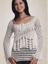 Белая блуза с кистями