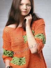 Оранжевый пуловер с мотивами, фото