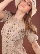 Ажурный пуловер с косичкой