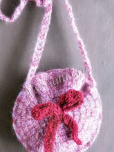 Круглая сумка крючком с бантиком