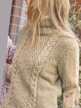 Бежевый свитер с косами, фото