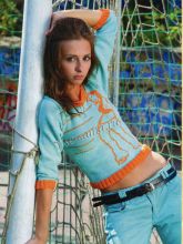 Бирюзовый пуловер с вышивкой