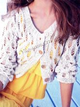 Короткий кремовый жакет спицами