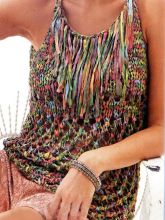 Зелёно-пёстрый топ спицами