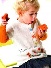 Белый жакет спицами с вышивкой