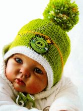 Шапочка спицами с помпоном Зеленый король