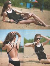 Черный купальник с фиолетовой отделкой и колье