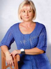 Удлиненный пуловер с дорожками из кос