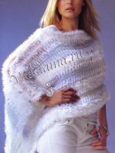 Белое пончо на вилке