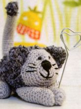 Кот-держатель для фотографий