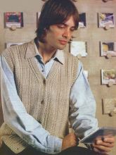 Жилет бежевого цвета